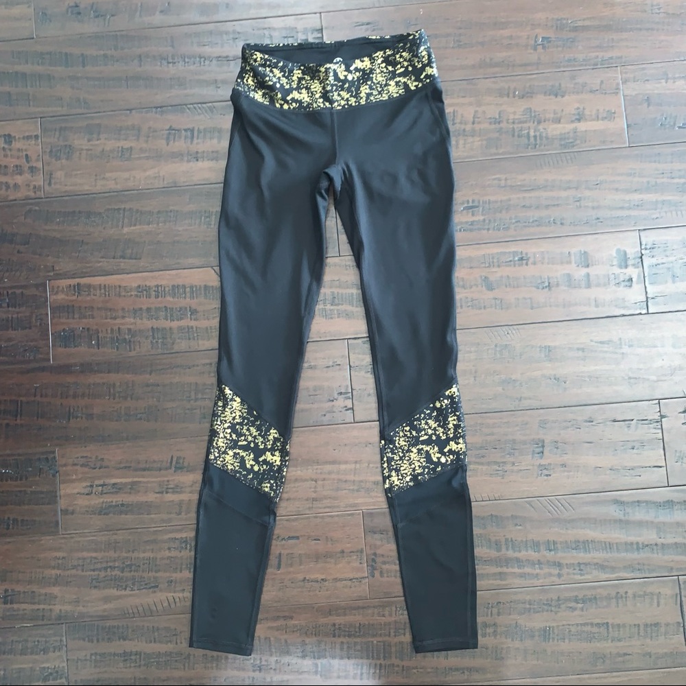 Gaiam Black Leggings with Gold Accent and Mesh Panels - Picture 2 of 10